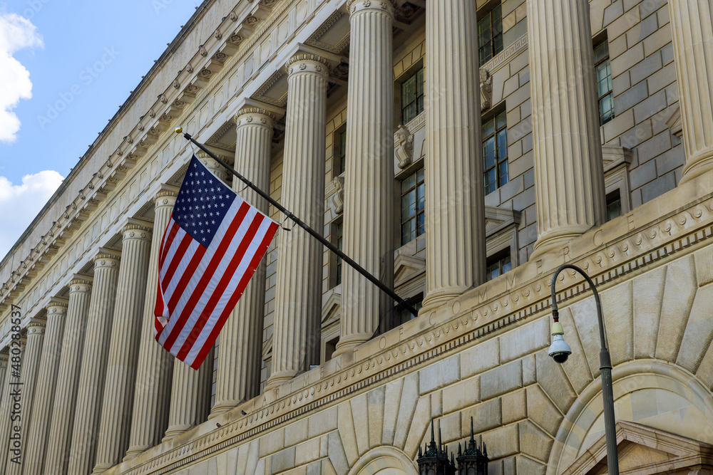 US office building detail with US flag in Washington DC United States