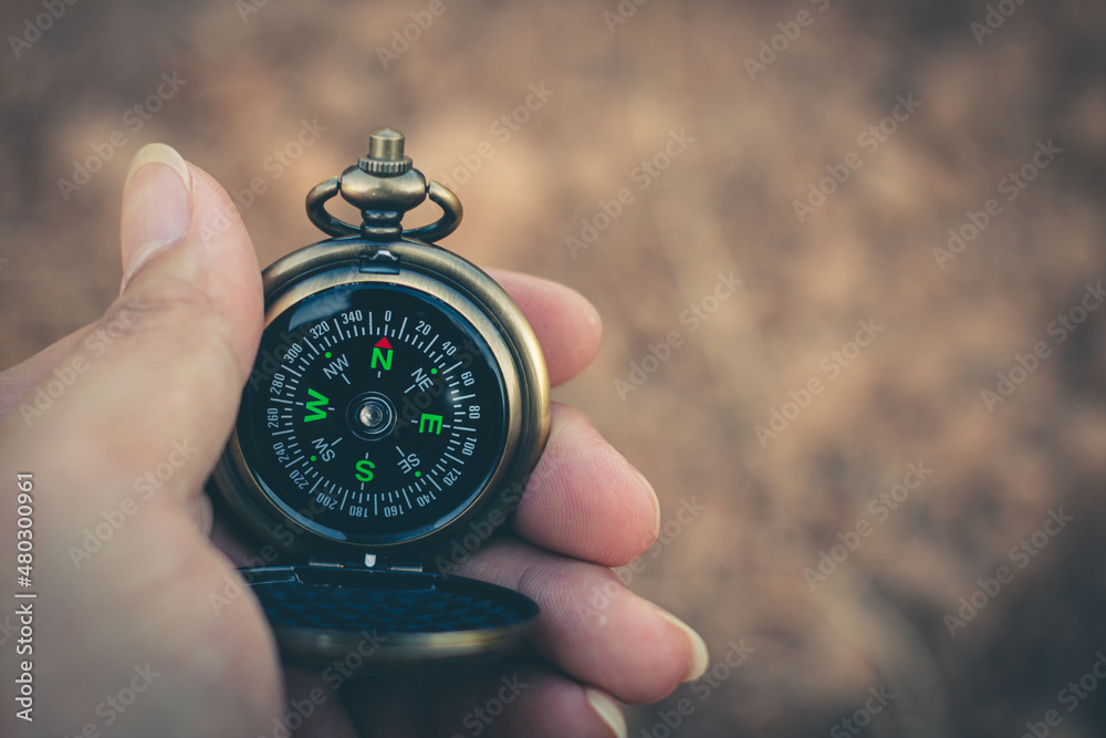 Travel of tourists with compass. compass of tourists on mountain. Travel of tourists with compass. compass of tourists on mountain.