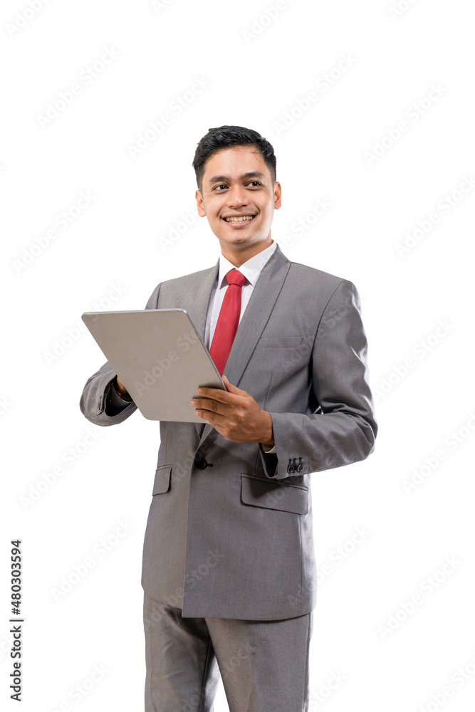 businessman holding tablet pc isolated over white background