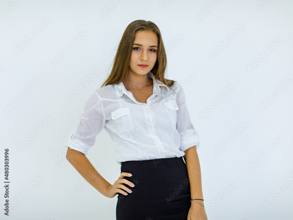 Portrait isolated studio cutout shot of Caucasian young beautiful long brunette hair female businesswoman employee in casual business outfit standing smiling look at camera posing on white background Portrait isolated studio cutout shot of Caucasian young beautiful long brunette hair female businesswoman employee in casual business outfit standing smiling look at camera posing on white background