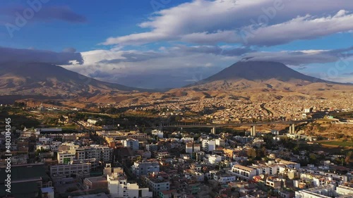 Arequipa cityscape and volcano moving forward drone photo
