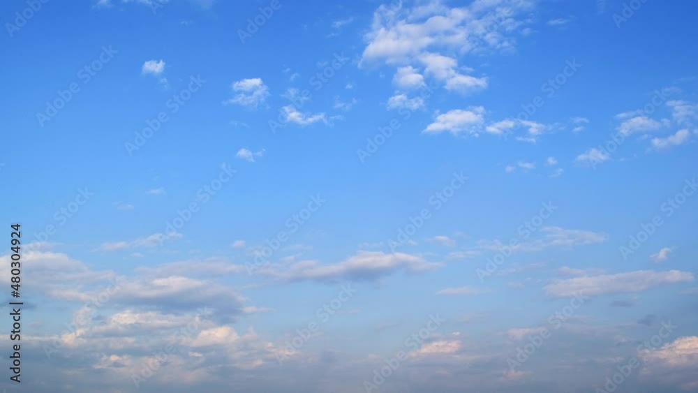 Blue sky with fluffy cloud time lapse on a sunny day 4k footage. Blue sky with fluffy cloud time lapse on a sunny day 4k footage.