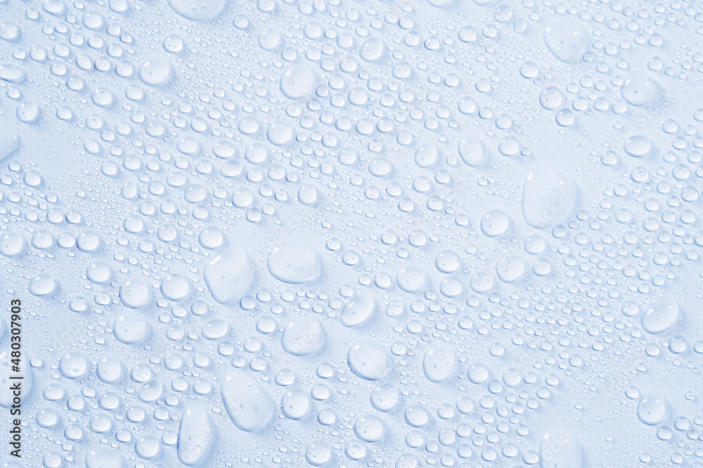Cosmetics moisturizing liquid drops on a light white pastel background. Hyaluronic acid, toner or lotion