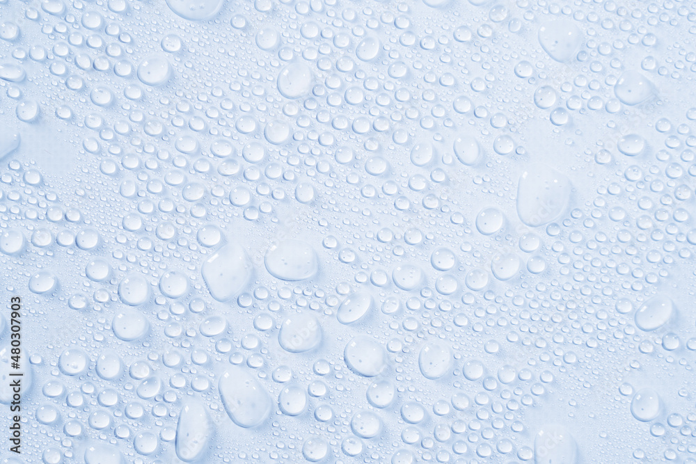 Cosmetics moisturizing liquid drops on a light white pastel background. Hyaluronic acid, toner or lotion Cosmetics moisturizing liquid drops on a light white pastel background. Hyaluronic acid, toner or lotion