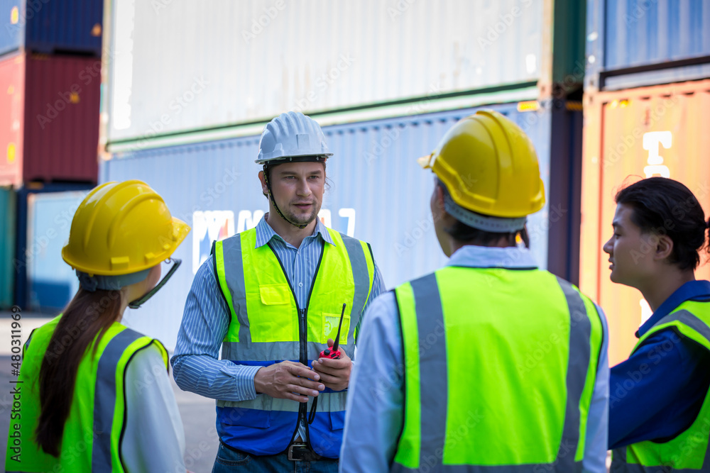 Foreman or worker work at Container cargo site check up goods in container. Foreman or worker checking on shipping containers. Logistics and shipping. Foreman or worker work at Container cargo site check up goods in container. Foreman or worker checking on shipping containers. Logistics and shipping.