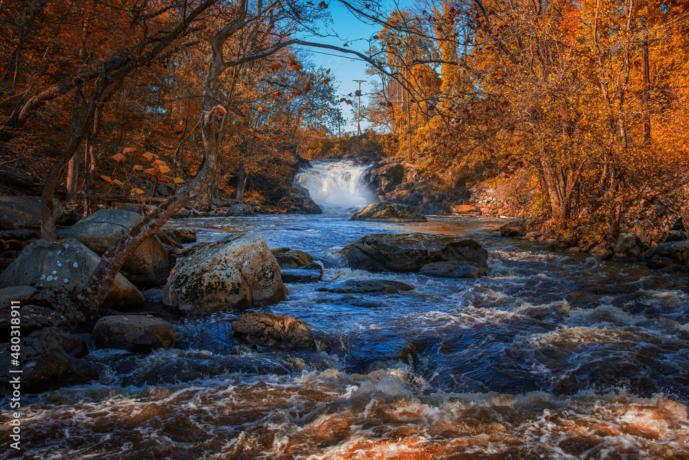 waterfall in autumn forest waterfall in autumn forest