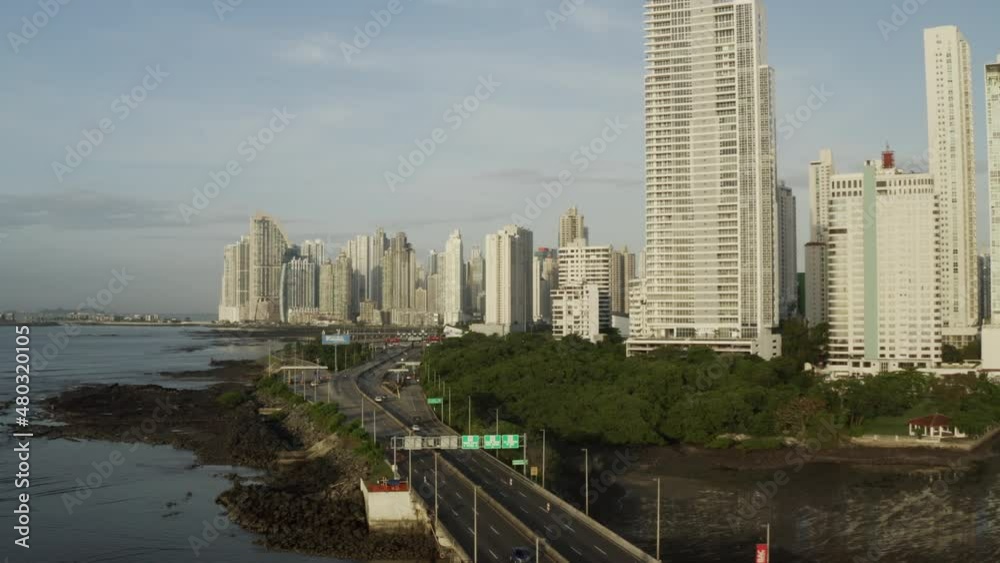 aerial view of tall buildings in Panama City near the Pacific Ocean, slide close up aerial view of tall buildings in Panama City near the Pacific Ocean, slide close up