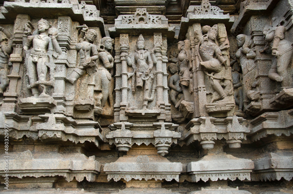Sculptures carved on the outer wall of the Laxminarayana temple one of the five rock temples inside Bahadurgad, Pedgaon, Taluka Shrigonda, Maharashtra, India