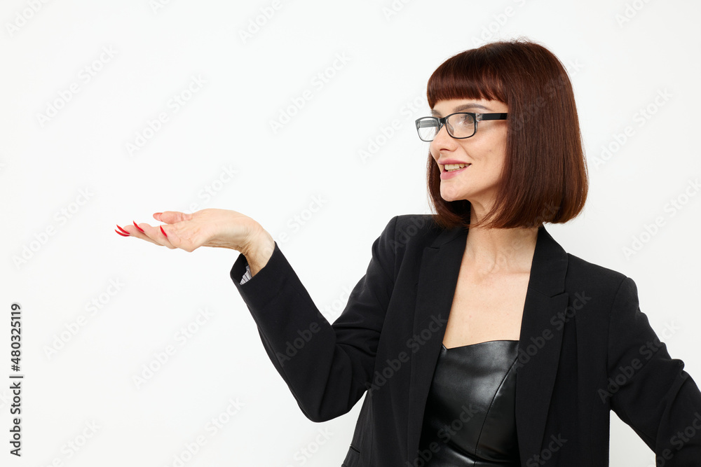 attractive woman posing with glasses a leather suit black jacket isolated background attractive woman posing with glasses a leather suit black jacket isolated background