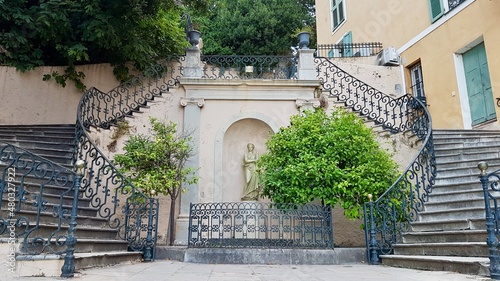 Beautiful stairs in old town of Bastia, leading from old harbor to citadel. Corsica, France.