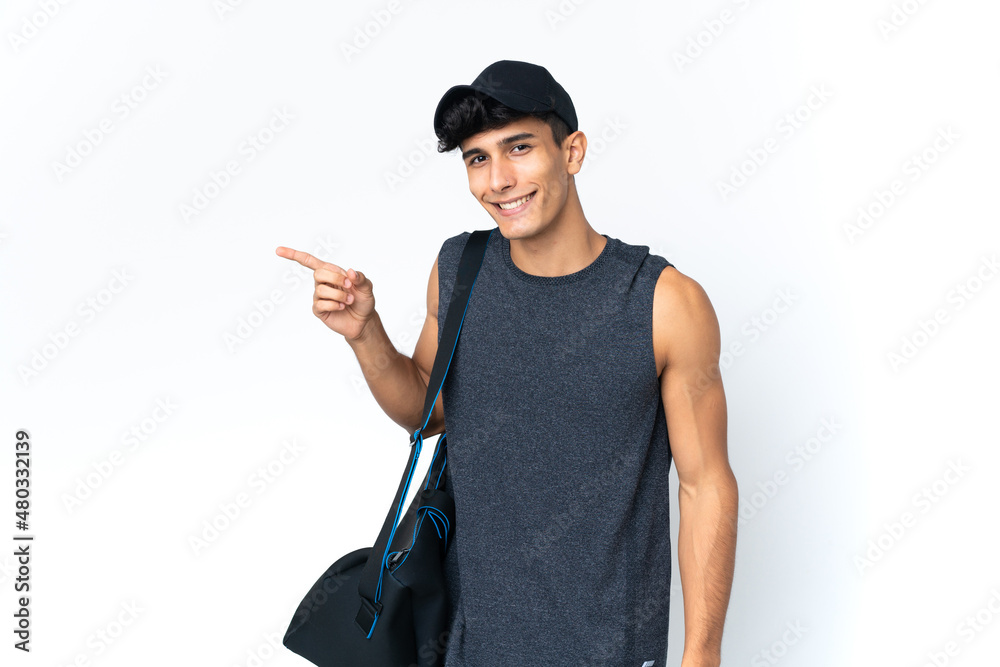 Young sport Argentinian man with sport pointing finger to the side Young sport Argentinian man with sport pointing finger to the side