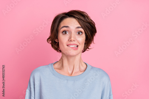 Canvas Photo of impressed millennial bob hairdo lady bite mouth wear blue sweatshirt is