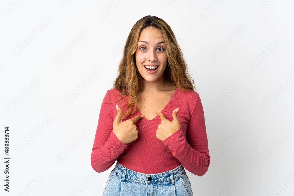 Young blonde woman isolated on blue background with surprise facial expression Young blonde woman isolated on blue background with surprise facial expression