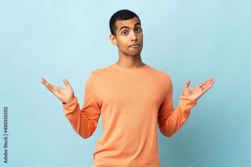 African American man over isolated background making doubts gesture African American man over isolated background making doubts gesture