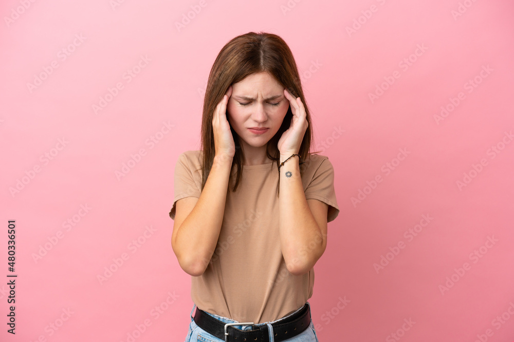 Young English woman isolated on pink background with headache Young English woman isolated on pink background with headache