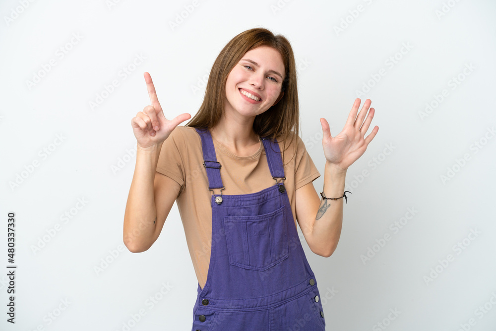 Young English woman isolated on white background counting seven with fingers Young English woman isolated on white background counting seven with fingers