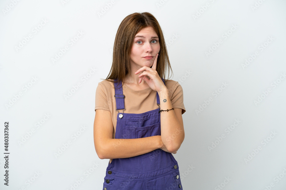 Young English woman isolated on white background and thinking Young English woman isolated on white background and thinking