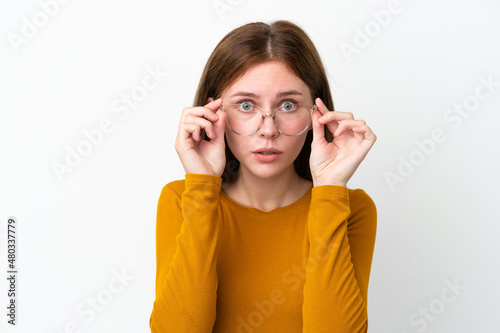 Young English woman isolated on white background With glasses and frustrated expression