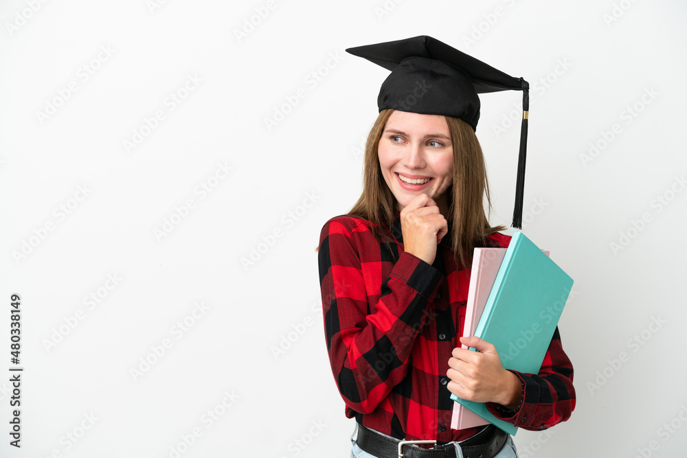 Young English student woman isolated on white background looking to the side and smiling Young English student woman isolated on white background looking to the side and smiling