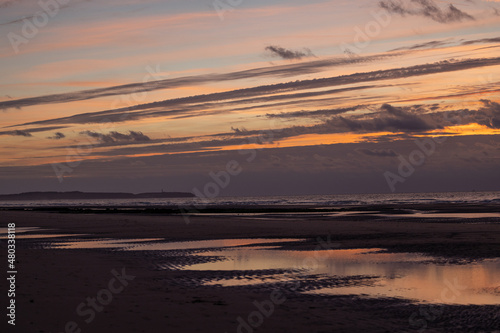 Dramatic sunset on the beach with beautiful colorful sky  Cap Blanc Nez  opal coast of France  Europe. High quality photo