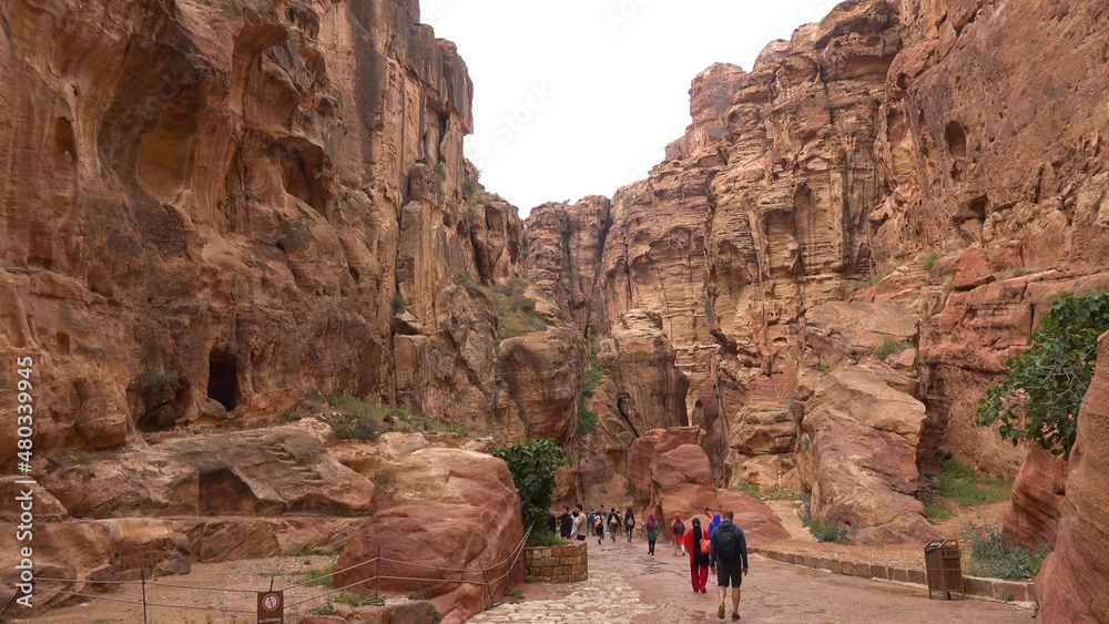 Tourist route through the gorge to Petra - Nabataean rock temple. Jordan