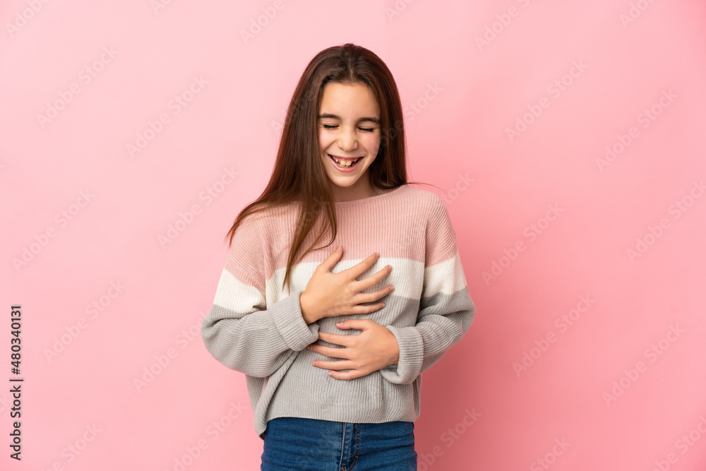 Little girl isolated on pink background smiling a lot Little girl isolated on pink background smiling a lot