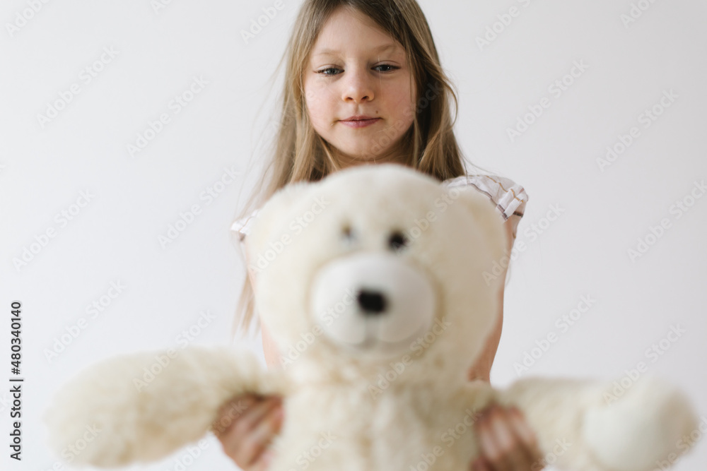 little girl with her toy - teddy bear day concept little girl with her toy - teddy bear day concept