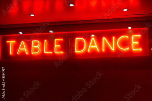 Photography Red sign in red light district TABLE DANCE, entertainment industry