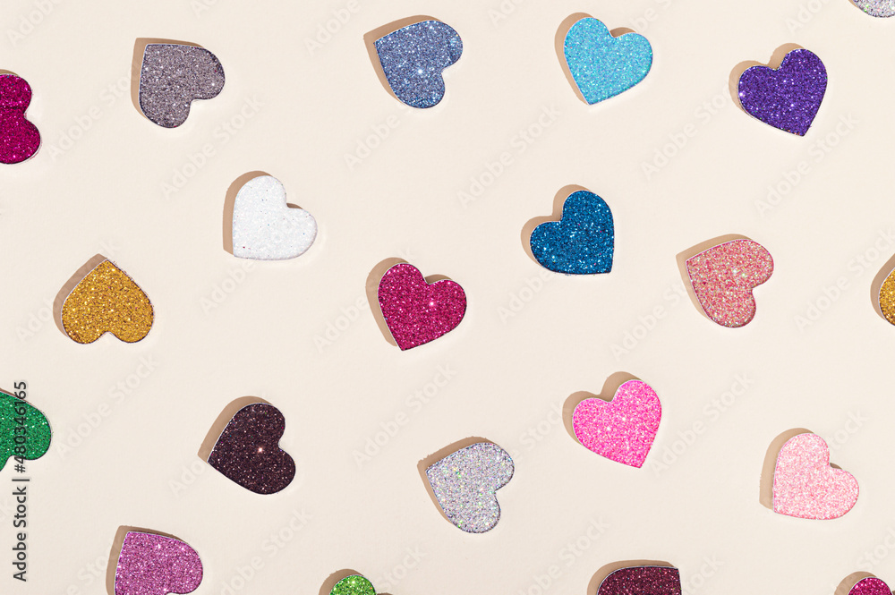 Colorful hearts on a beige background. Valentines day love aesthetic  concept. Heart pattern Stock Photo