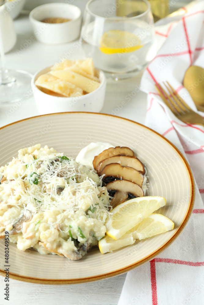Concept of tasty food with risotto with mushrooms
