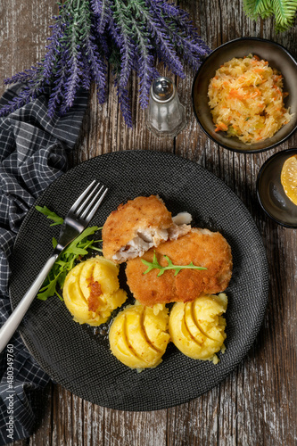 Fried cod fillet served.