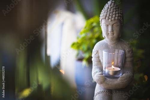 Carta da parati Buddha statue close-up in beautiful light