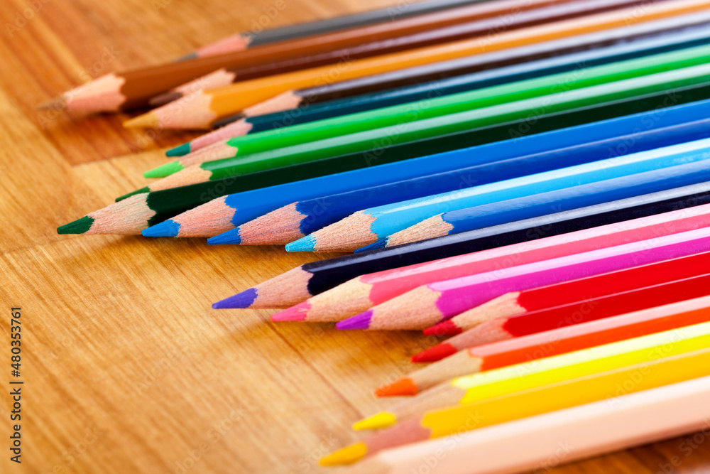 Creating Depth with Colorful Pencils on Wooden Table Creating Depth with Colorful Pencils on Wooden Table
