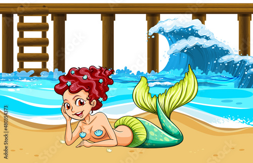 Beautiful mermaid lying on the beach