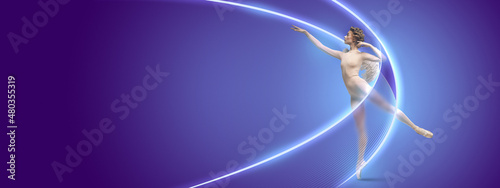 Tableau sur toile Graceful ballet dancer or classic ballerina dancing isolated on dark blue background in neon with luminescent lines, shapes