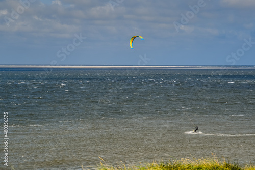 Den Helder, the Netherlands. November 2021. A kitesurfer off the coast near Den Helder, Nederland. 