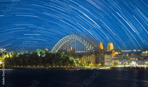 Startrails  Star trails Sydney Harbour Bridge star trails in the night sky NSW Australia  © Elias Bitar