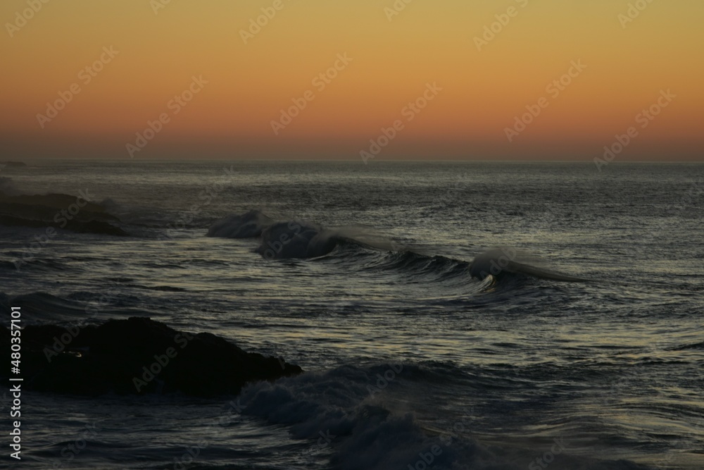 waves at sunset in the Canary Island contemplating its colors and horizon