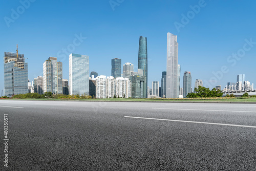 Road and Chinese modern city buildings background