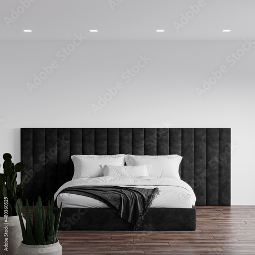 Monochrome black and white bedroom of a hotel room with a large bed in the center. White blank wall, white linen bedding. Beautiful dark velvet panel headboard. Cactus like plant. 3d rendering  photo