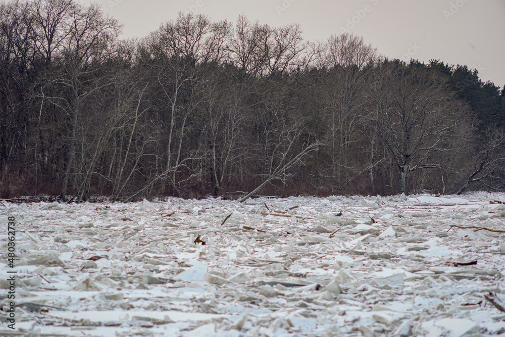 Naklejka premium Ice covered river in the winter