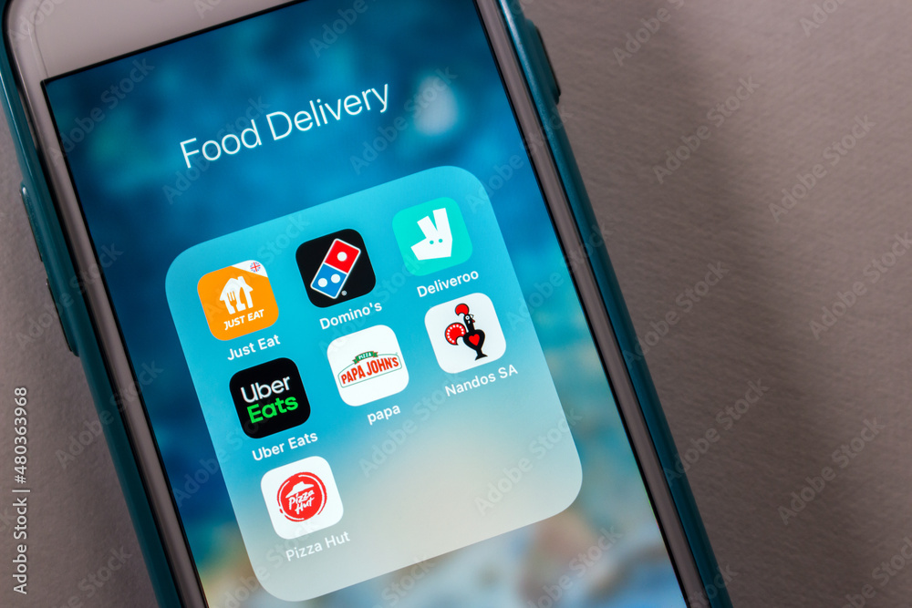 Kumamoto, JAPAN - Aug 16 2021 : Popular food delivery and fast food  services in UK (Just Eat, Domino's, Deliveroo, Uber Eats, Pizza Hut, Papa  John's and Nando's) on iPhone Stock Photo | Adobe Stock
