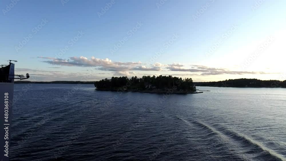 Small island in Stockholm channel, shot from cruise ship Small island in Stockholm channel, shot from cruise ship
