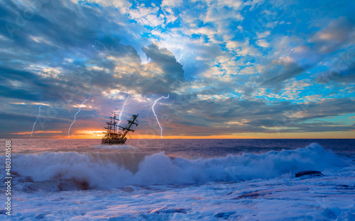 Obraz na plátně Sailing old ship in storm sea on the background heavy clouds with lightning at s