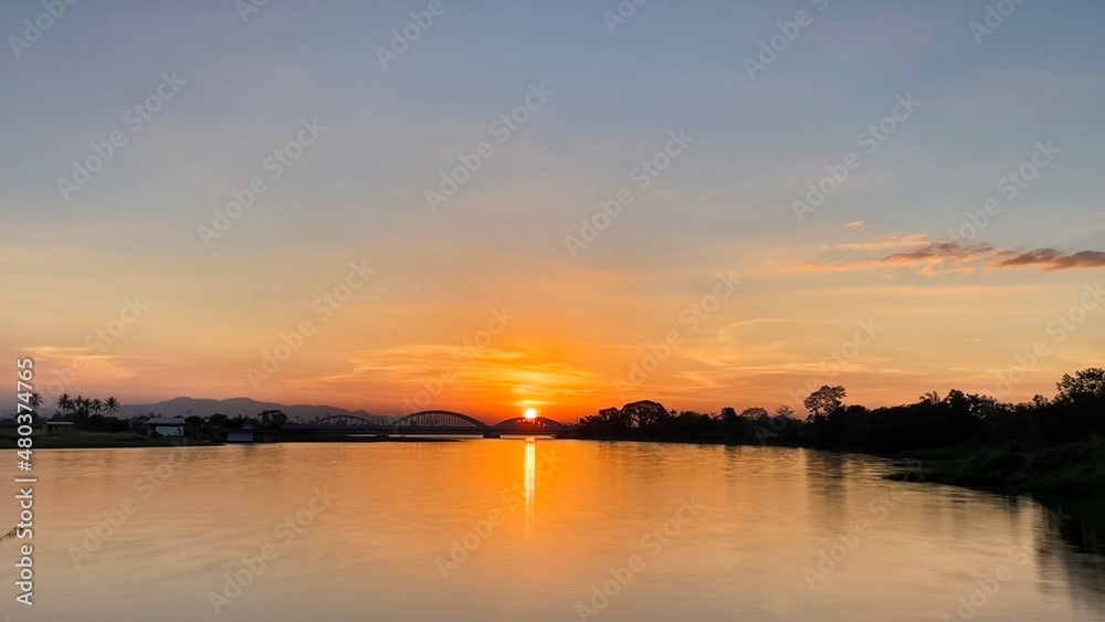 orange sunset over the river