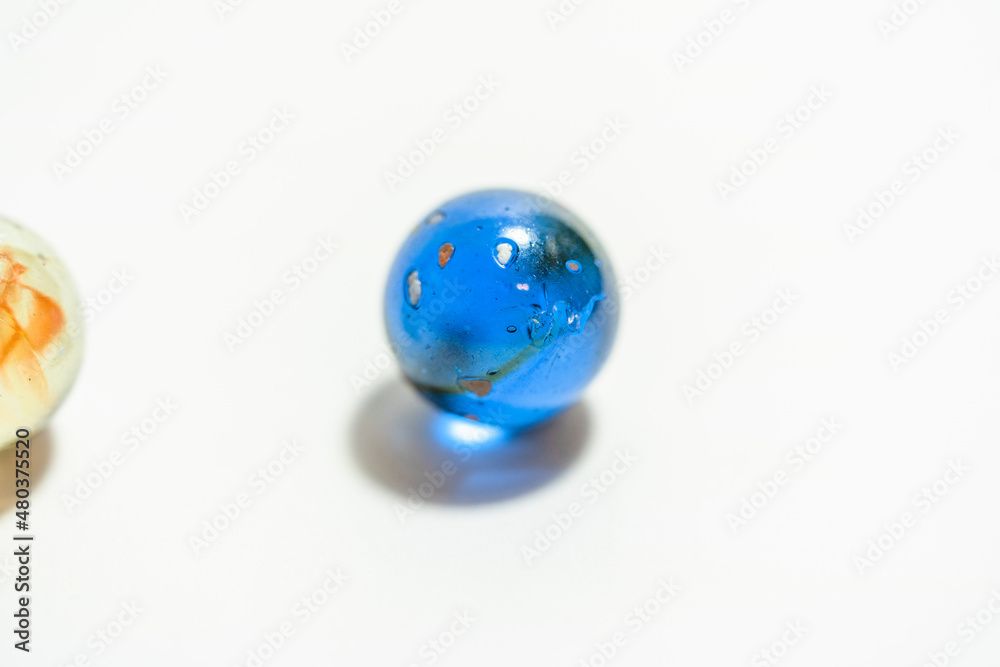 Colored glass balls and marble taw, children toy, decoration