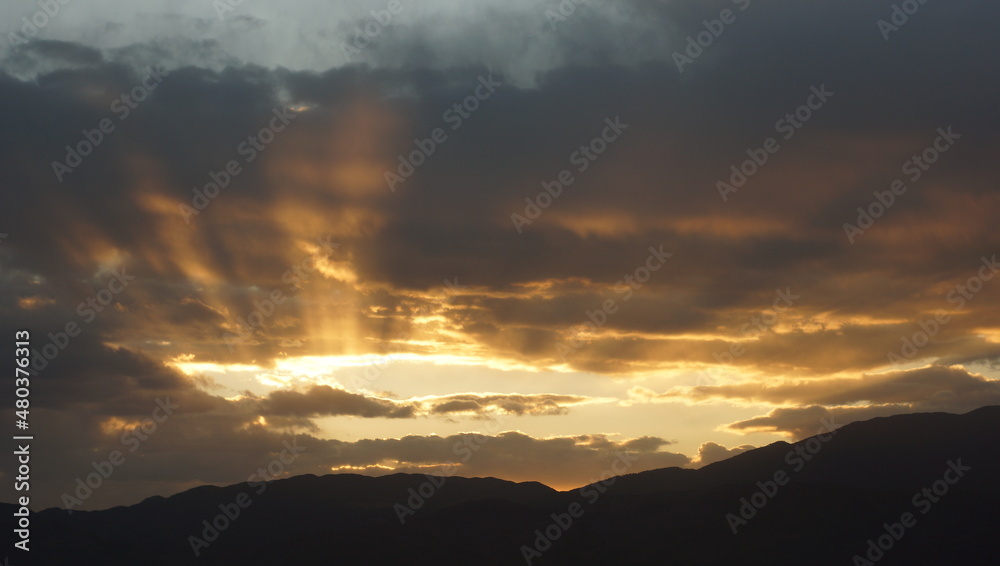 crepuscular rays in the sky for religion morning or nature background use