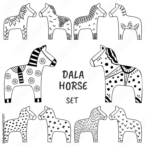 Dala horses set. Ink hand drawn sketch of traditional Swedish Dalarna horse scandinavian style minimalistic outline for cards, tourism related design photo