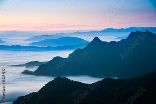 mountains in the morning with fog