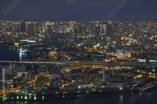 Jungle of skyscrapers at night in Osaka City © suronin